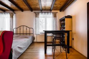 Posteľ alebo postele v izbe v ubytovaní Apartmány Pod Šerákem