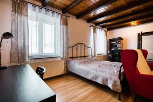 Posteľ alebo postele v izbe v ubytovaní Apartmány Pod Šerákem