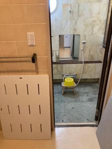 Een badkamer bij Marina Bay Atami