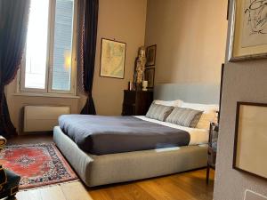 Postel nebo postele na pokoji v ubytování A Casa Di Paola Suite
