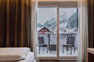 Voodi või voodid majutusasutuse Hotel Heini toas