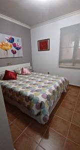 Ein Bett oder Betten in einem Zimmer der Unterkunft Vivienda vacacional