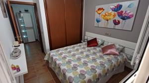 Ein Bett oder Betten in einem Zimmer der Unterkunft Vivienda vacacional