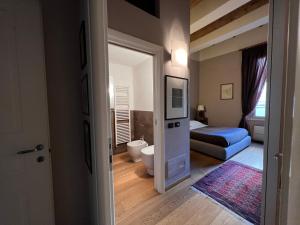Postel nebo postele na pokoji v ubytování A Casa Di Paola Suite