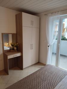 Posteľ alebo postele v izbe v ubytovaní Apartments Joško