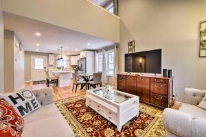 a living room with a couch and a tv at Worcester Vacation Rental with Ideal Location! in Worcester