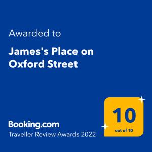a yellow sign that sayswards place on oxford street at James's Place on Oxford Street in London