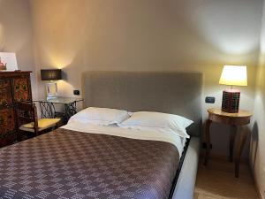 Postel nebo postele na pokoji v ubytování A Casa Di Paola Suite