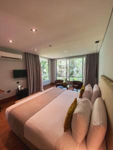 Postel nebo postele na pokoji v ubytování Selvaje Lodge Iguazu