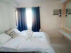 Postel nebo postele na pokoji v ubytování Studio Condo Unit for rent in Cebu City Mabolo