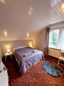 Ένα ή περισσότερα κρεβάτια σε δωμάτιο στο Willa Arte