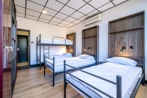 Postel nebo postele na pokoji v ubytování Vola Hostel