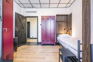 Postel nebo postele na pokoji v ubytování Vola Hostel