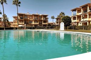 The swimming pool at or close to Novo Sancti Petri, La Barrosa, 2 Beds Room Apartamento by Chiclana Dreams