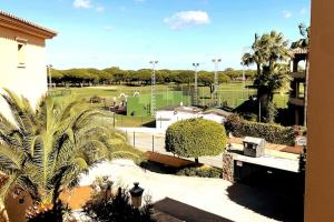 A garden outside Novo Sancti Petri, La Barrosa, 2 Beds Room Apartamento by Chiclana Dreams