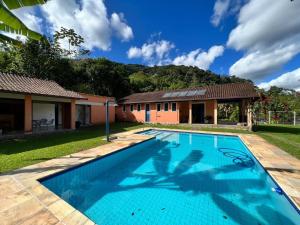 Πισίνα στο ή κοντά στο Recanto Lírio da Paz