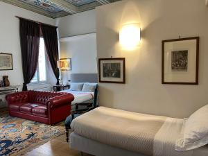 Postel nebo postele na pokoji v ubytování A Casa Di Paola Suite