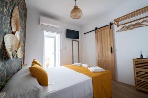 Posteľ alebo postele v izbe v ubytovaní Casa Alegría Completa