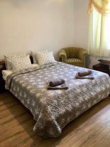 Säng eller sängar i ett rum på Ranczo Stare Objezierze