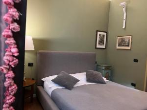 Postel nebo postele na pokoji v ubytování A Casa Di Paola Suite
