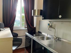 Kuchyň nebo kuchyňský kout v ubytování A Casa Di Paola Suite