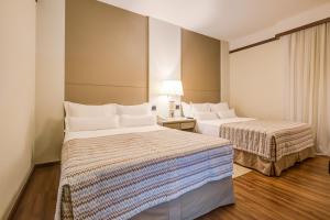 Cama ou camas em um quarto em Bourbon Thermas Eco Resort Cataratas do Iguacu