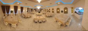 an overhead view of a banquet hall with tables and chairs at Gasthof Legend in Burgthann