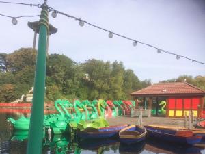 a group of boats parked in a water park at Scarborough Rose Apartment in Scarborough