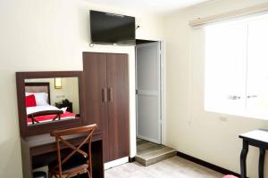 TV a/nebo společenská místnost v ubytování Hotel Loja Bella + 37 fotografií
