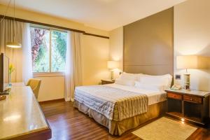 Cama ou camas em um quarto em Bourbon Thermas Eco Resort Cataratas do Iguacu
