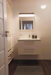 Et badeværelse på Apartament Pomarańcza