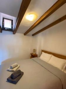 A bed or beds in a room at Best view of Meteora in ''Stavros home''