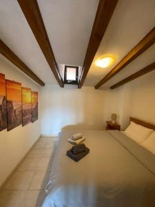 A bed or beds in a room at Best view of Meteora in ''Stavros home''