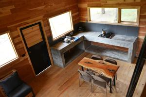 Cabaña de Montaña Parque La Pirámideにあるベッド +7枚の写真