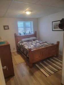 Łóżko lub łóżka w pokoju w obiekcie Saugeen Shores Vacation Rental