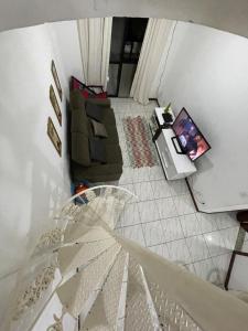 Зона вітальні в Cobertura Duplex Braga Cabo Frio
