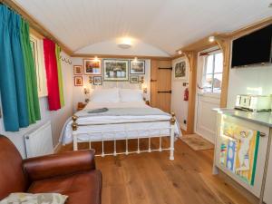 En eller flere senge i et værelse på The Studio