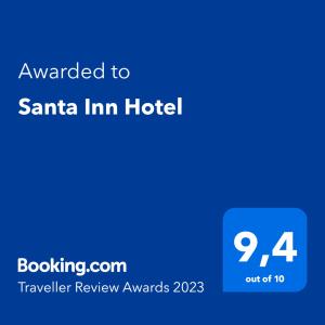 a blue screen with the text awarded to santa inn hotel at Santa Inn Hotel in Balneário Camboriú