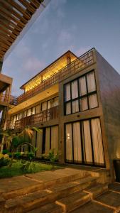 a building with a staircase in front of it at Aldea Paraíso - Adults only - Boutique hotel in Puerto Escondido