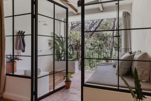 Voodi või voodid majutusasutuse Sendero Hotel toas
