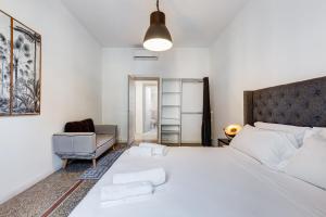 Voodi või voodid majutusasutuse Re di Roma Guest House toas