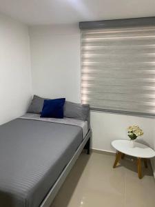 Postel nebo postele na pokoji v ubytování Hermoso, moderno y confortable apartamento.