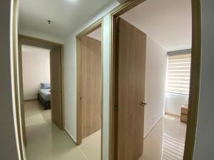 Postel nebo postele na pokoji v ubytování Hermoso, moderno y confortable apartamento.