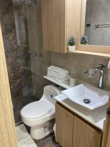 Koupelna v ubytování Hermoso, moderno y confortable apartamento.