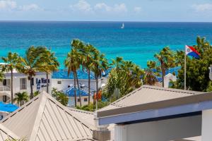 a view of the ocean from the balcony of a resort at La Vista Resort in Simpson Bay
