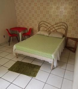 Un ou plusieurs lits dans un hébergement de l'établissement Canto da paz