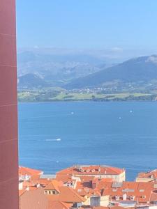 a view of a city and a large body of water at Apartamento Santander in Santander