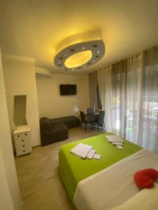Postel nebo postele na pokoji v ubytování Vapama Rooms