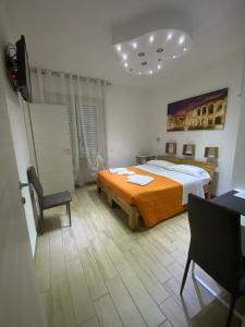 Postel nebo postele na pokoji v ubytování Vapama Rooms