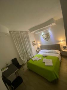 Postel nebo postele na pokoji v ubytování Vapama Rooms